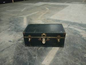 lot 1204 image: Vintage Black Steamer Trunk Filled With Wooden Baskets
