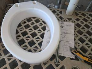 lot 777 image: Carex Raised Toilet Seat Cover 4 Tall - Retail $0