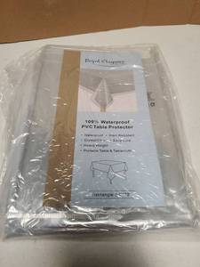 lot 18356 image: Royal Elegance 100% Waterproof PVC Table Protector Rectangle 54x72 - Retail $40