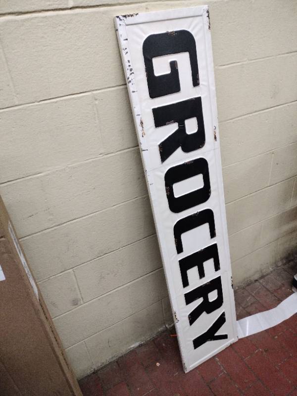 lot 61092 image: Decorative Metal Grocery Sign