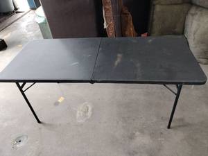 lot 20919 image: 6 Ft Black Plastic Folding Table