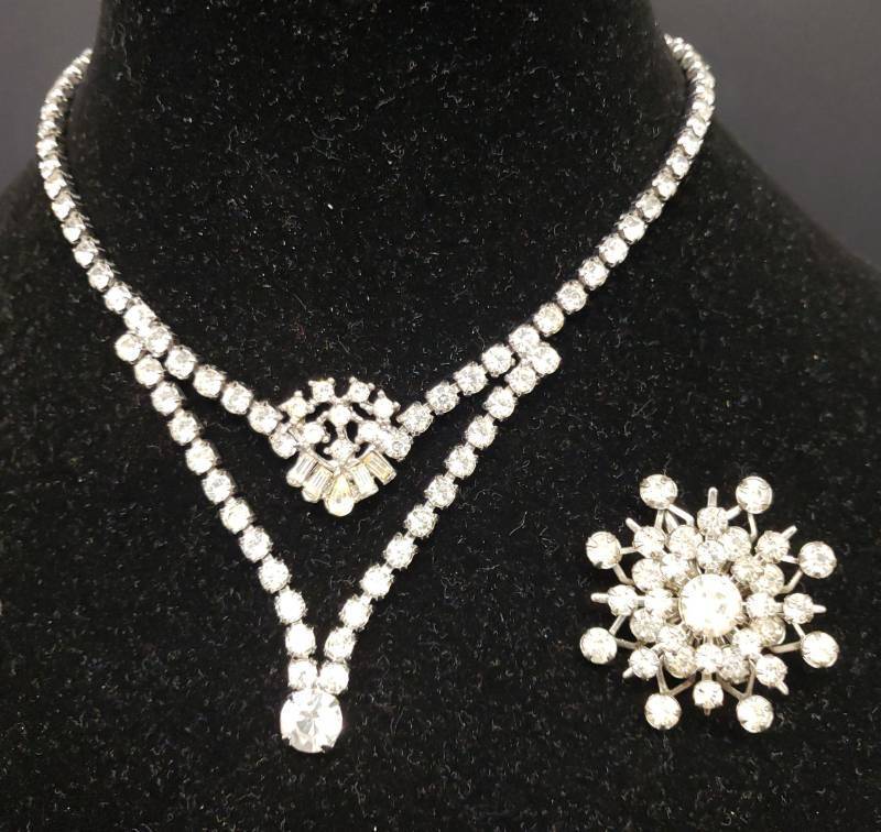 lot 116 image: Vintage 1950s-1960s Silver Metal & Clear Rhinestone Estate Statement Jewelry StarburstSnowflake Prong Set Brooch 1.5in W, and V Drop Chocker Necklace with Fold-over Clasp - 14in L