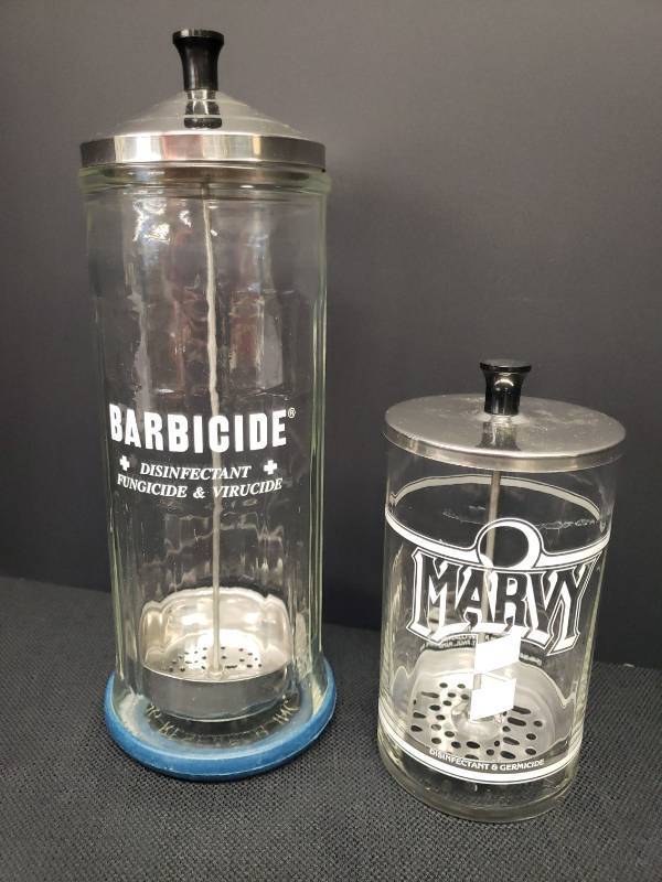 lot 122 image: Vintage Barber Shop Glass Sterilizer Canisters with pull up trays attached to lids - Barbicide & Marvy