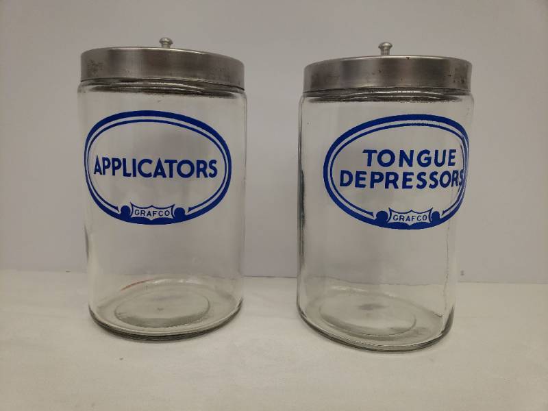 lot 124 image: Vintage GRAFCO Doctor Office Glass Supplies Canisters - with Stainless Steel Lids - Tongue Depressers & Applicators
