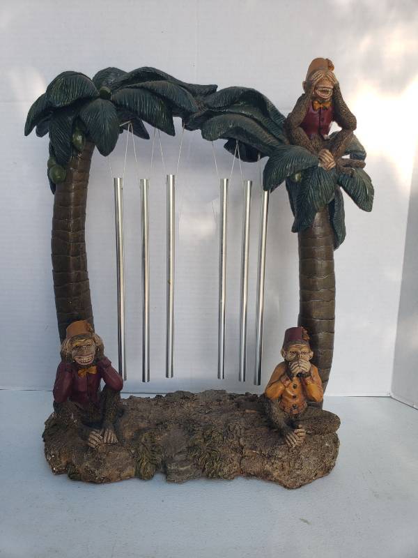 lot 99 image: Vintage Cast Resin 3 Wise Monkeys See No Evil, Hear No Evil, Speak No Evil with Tabletop Palm Tree Wind Chimes - 16in W x 6.5in D x 18in T