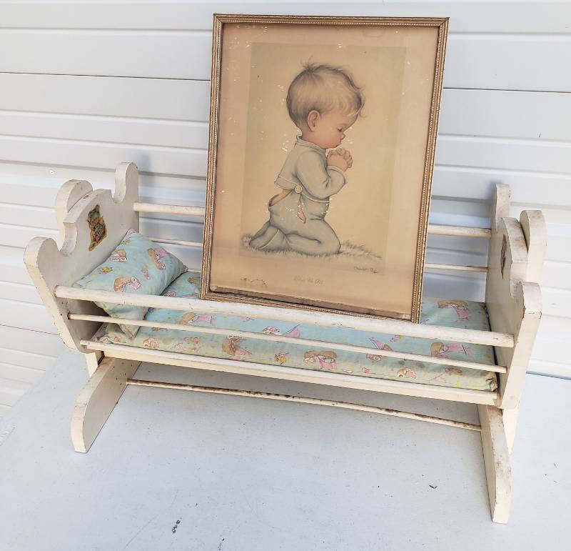 lot 155 image: Vintage 1940s Wood Rocking Doll Bed with Kitten & Teddy Bear Transfers - 26.5in L x 12in W x 15.5in T, and Vintage 1948 Artist Signed Bless Us All Framed Lithograph - 13.75in W x 17.75in T