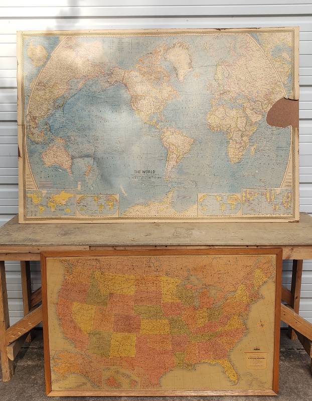 lot 168 image: Vintage Maps 1965 National Geographic World Map - Extra Large Wall Map is 67in W x 46in T, missing 1 Piece - on Hardboard Backing, and 1960s Wood Framed Rand McNally U.S. LIthograph Classroom Map - 50in W x 37in T