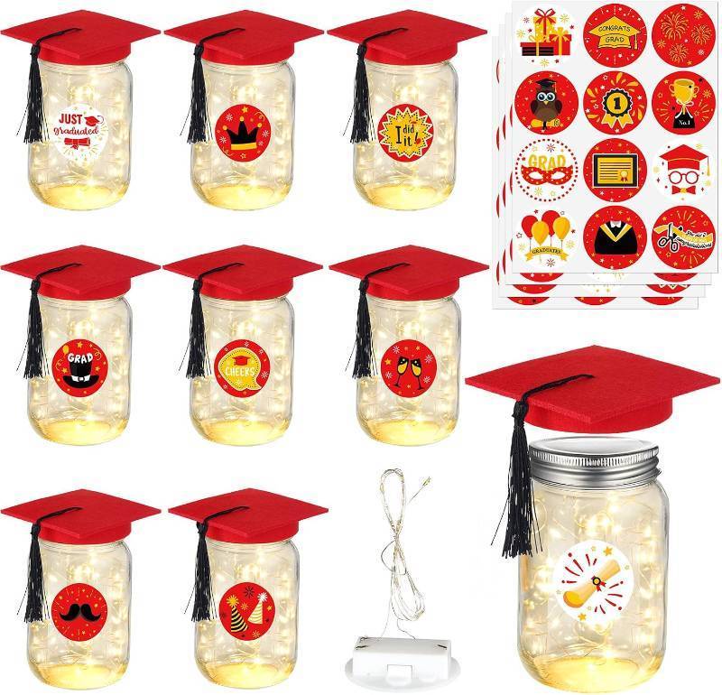 lot 4295 image: 8 Pack 2026 Graduation Centerpieces for Tables Mason Glass Jar Centerpieces with LED Lights Graduation Party Decorations Set with Caps and Stickers for High School College Congrats Grad Decor Supplies