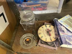lot 8 image: Mixed Lot Glass Items Clock VHS and Frame - Candle Holders Jar Bowls Hydrometer