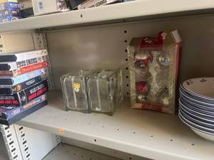 Two Shelf lot with VHS Movies Mixed Titles, bowls and glass bricks