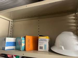 lot 39 image: Shelf lot with Manual Inflation Blood Pressure Monitor HEM-412C, hard hat, book, vintage iron