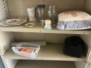 lot 40 image: 3 Shelf lot with White Wire Shelf Basket, Wrapping Paper, sewing items, jars and other items