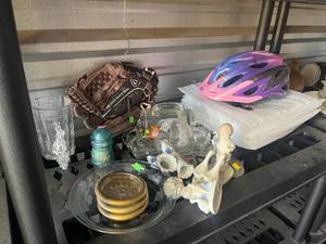 lot 50 image: Shelf full of items such as glass insulator and Youth Bike Helmet Pink Purple Blue Multi-Color