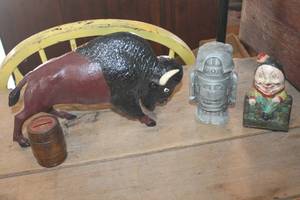 lot 3846 image: Antique Cast Iron Humpty Dumpty Bank and More