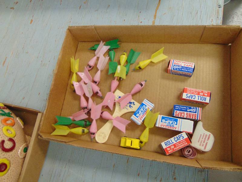 lot 1854 image: Vintage Cap Rockets wcaps