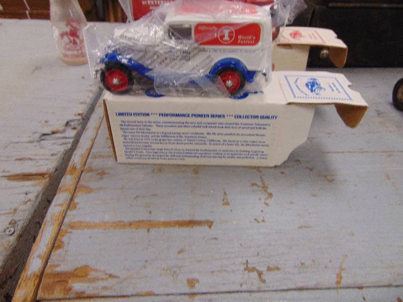 lot 2013 image: Performance Pioneers Diecast Bank by Ertl NIB