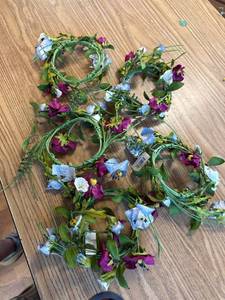 lot 3237 image: Five floral rings could possibly be opened for a swag
