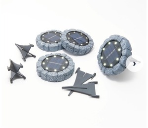 lot 3284 image: Bell and Howell Set of 4 8-LED Solar Stone Design Disk Lights