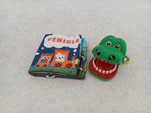 lot 20317 image: Soft Fabric Baby Book And Crocodile Teeth Toy