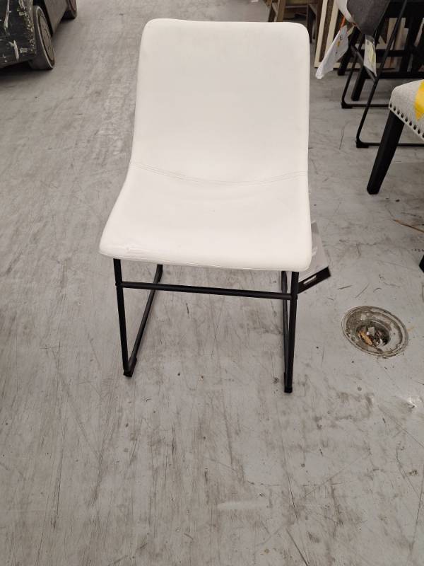 lot 20136 image: White Vinyl Upholstered Dining Chair w Black Metal Frame