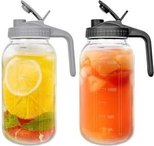 lot 401581 image: 2 Pack 64 oz Glass Pitchers with Lid,2 Quart Sun Tea Glass Jars for Outside,Half Gallon Wide Mouth Mason Jar Pitchers with Convenient Handle and Leak-Proof Design for Ice Tea Breast Milk Iced Coffee
