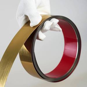 lot 271509 image: Hungbak Peel and Stick Metal Trim, Flexible Stainless Steel Molding for Wall, Fireplace, Mirror Frame, Craft and Home Decoration (Shiny Gold, 6m x 5cm)
