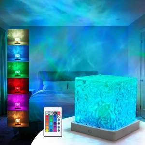lot 4039 image: Ocean Wave Projector Light, 16 Color LED Ambient Lighting with Remote  charge port pushed in 