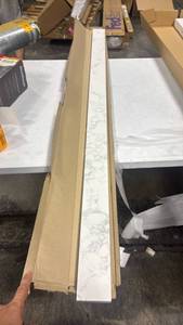 lot 5706 image: Carrara white engineered stone vanity backsplash 60in - Retail $0