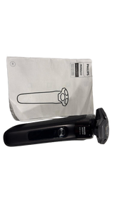 lot 5817 image: Philips Norelco Electric Shaver Head with Manual - Retail $0
