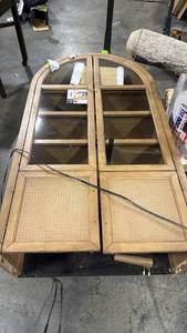 lot 5851 image: Arched Double-Door Display Cabinet with Glass Panels and Woven Lower Panels (missing bottom piece) - Retail $0