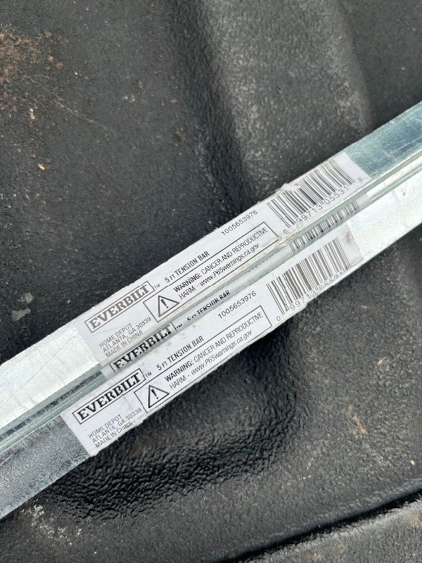 lot 110 image: Bundle of 4 Everbilt Chain Link Fence 58 in. Galvanized Steel Tension Bars