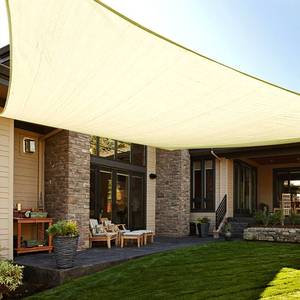 lot 47040 image: 6.5 x 10 Rectangle Sun Shade Sail for Patio, Butter Cream - Retail $25