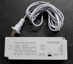 lot 47078 image: LED Cabinet Light with Switch Dedicated Power Supply 12V24V Interface Transformer(60W-24V) - Retail $32