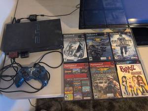 lot 90 image: Sony PlayStation 2 Console Bundle with 6 Games and Controller. Please review description.