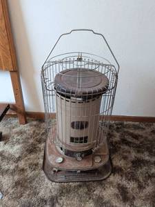 lot 181 image: Comfort Glow Kerosene Heater with Wire Cage Guard