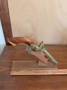 lot 204 image: Decorative Flintlock Pistol Model with Wood Display Stand and Plane Tool