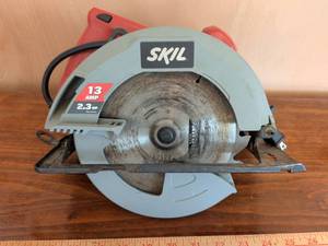 lot 223 image: SKIL 13 Amp 2.3 HP Corded Circular Saw