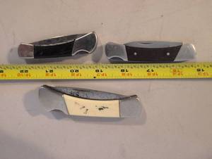 lot 240 image: Buck 503U Folding Pocket Knife and Sabre 547 Folding Knife Lot