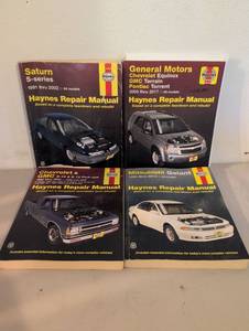 lot 300 image: Haynes Repair Manual Lot 4 Books Saturn Chevrolet GMC Pontiac Mitsubishi