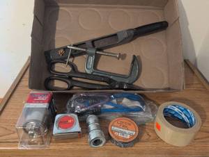 lot 316 image: Plumbing Hand Tool Lot with Clamps, Filters, Tape and Accessories