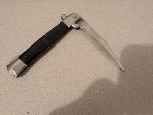 lot 538 image: Stainless Steel Folding Knife with Black Handle