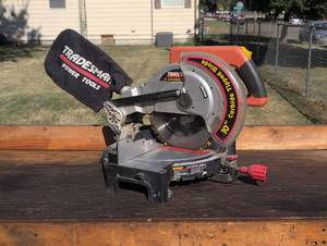 lot 601 image: Tradesman 10 Inch Compound Miter Saw with Dust Bag