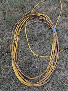 lot 704 image: Garden Hose Coil Yellow and Brown with Connectors
