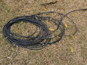 lot 709 image: Black Electrical Cable Coil with Connectors