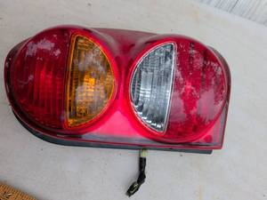 lot 718 image: Vehicle Tail Light Assembly Red Dual Lens RH