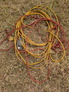 lot 731 image: Yellow extension cord. Red hanging light extension cord