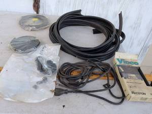 lot 743 image: Black Rubber Weatherstrip Seal Strip Lot to plug in cords and VHS Head Cleaner
