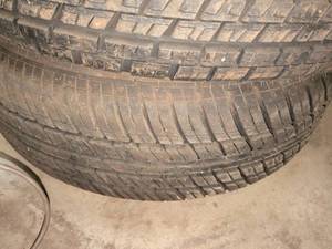 lot 831 image: 3 Radial Tires with Wheels P21570R14 H714