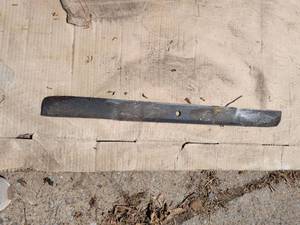 lot 942 image: Lawn Mower Blade with Center Mounting Hole