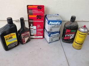 lot 1005 image: Automotive Fluids and Filters Lot Power Steering, Oil Filters, Transmission Fluid, Paint